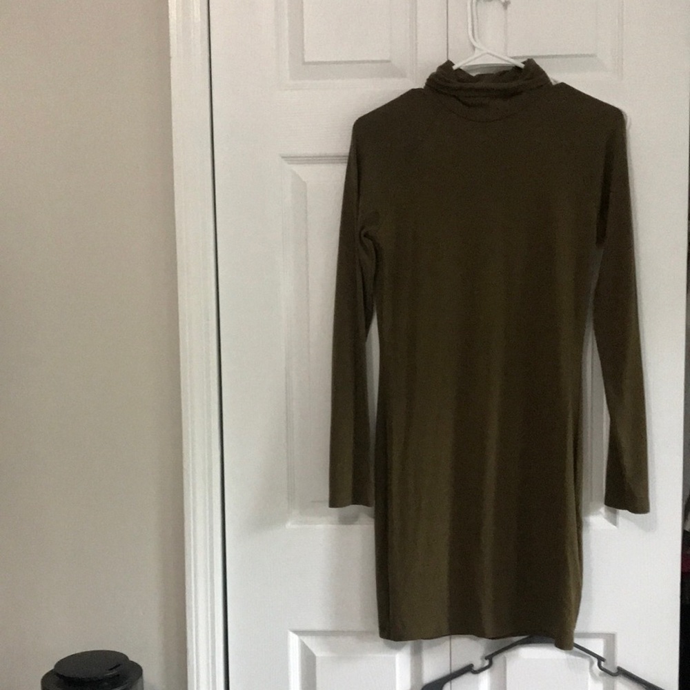Long sleeve tight dress.     Dark green.  Above the knee